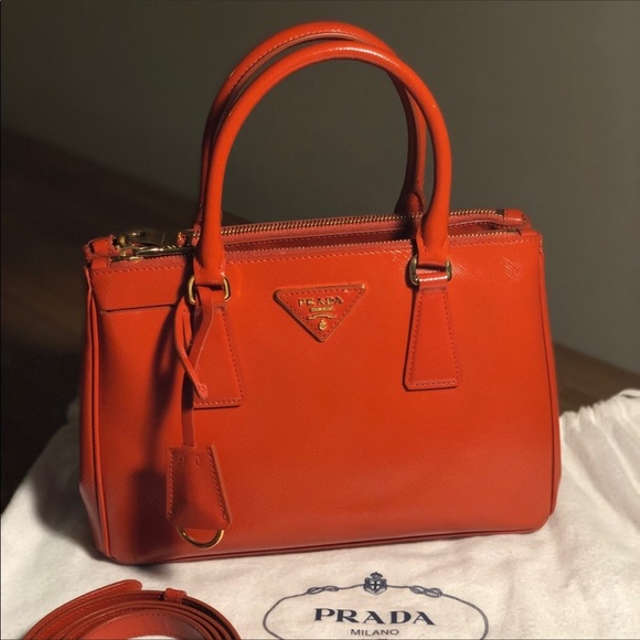 Prada Handbags - Bright orange Prada Saffiano Bag!